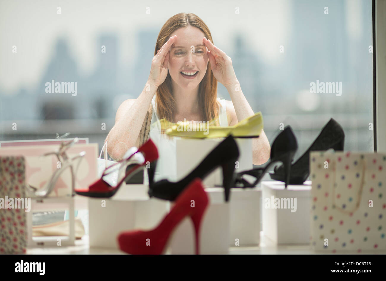 Woman shopping for shoes Stock Photo