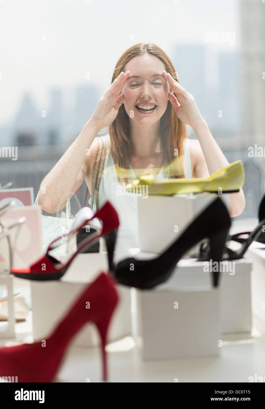Woman shopping for shoes Stock Photo