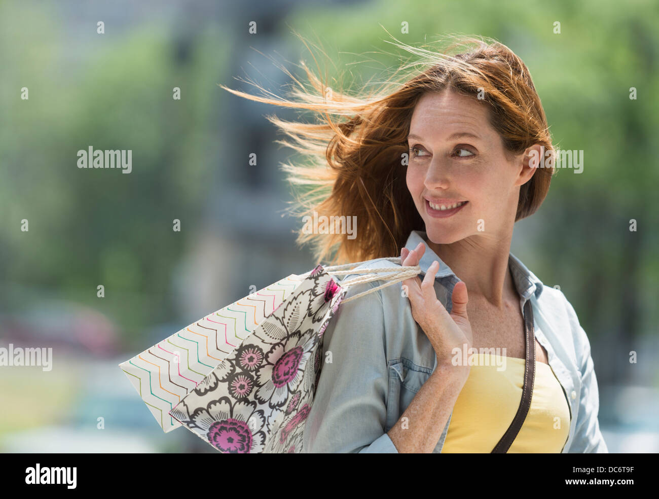 Woman with shopping bags Stock Photo