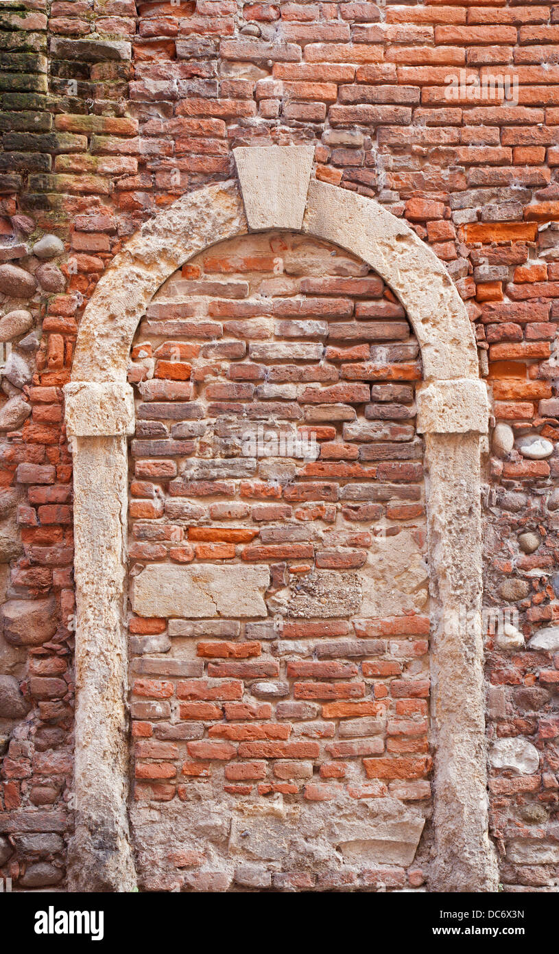 walled door of old house in Verona Stock Photo