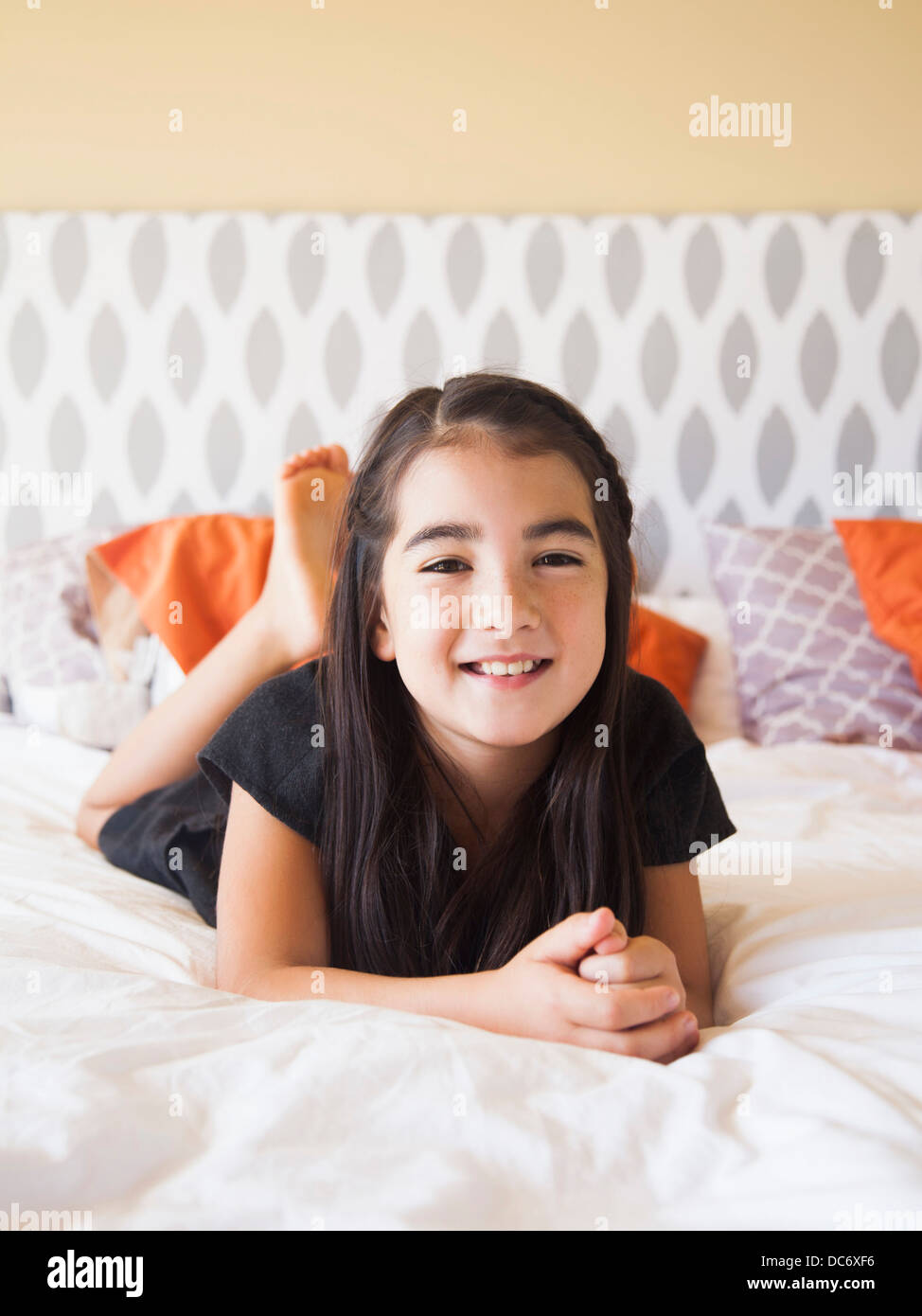 Portrait of girl (89) laying on bed Stock Photo Alamy