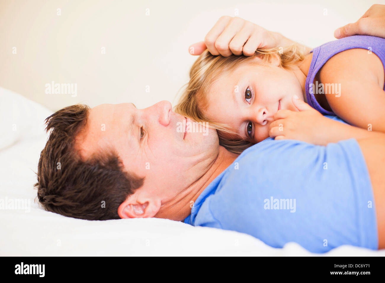 Father embracing daughter (2-3) Stock Photo