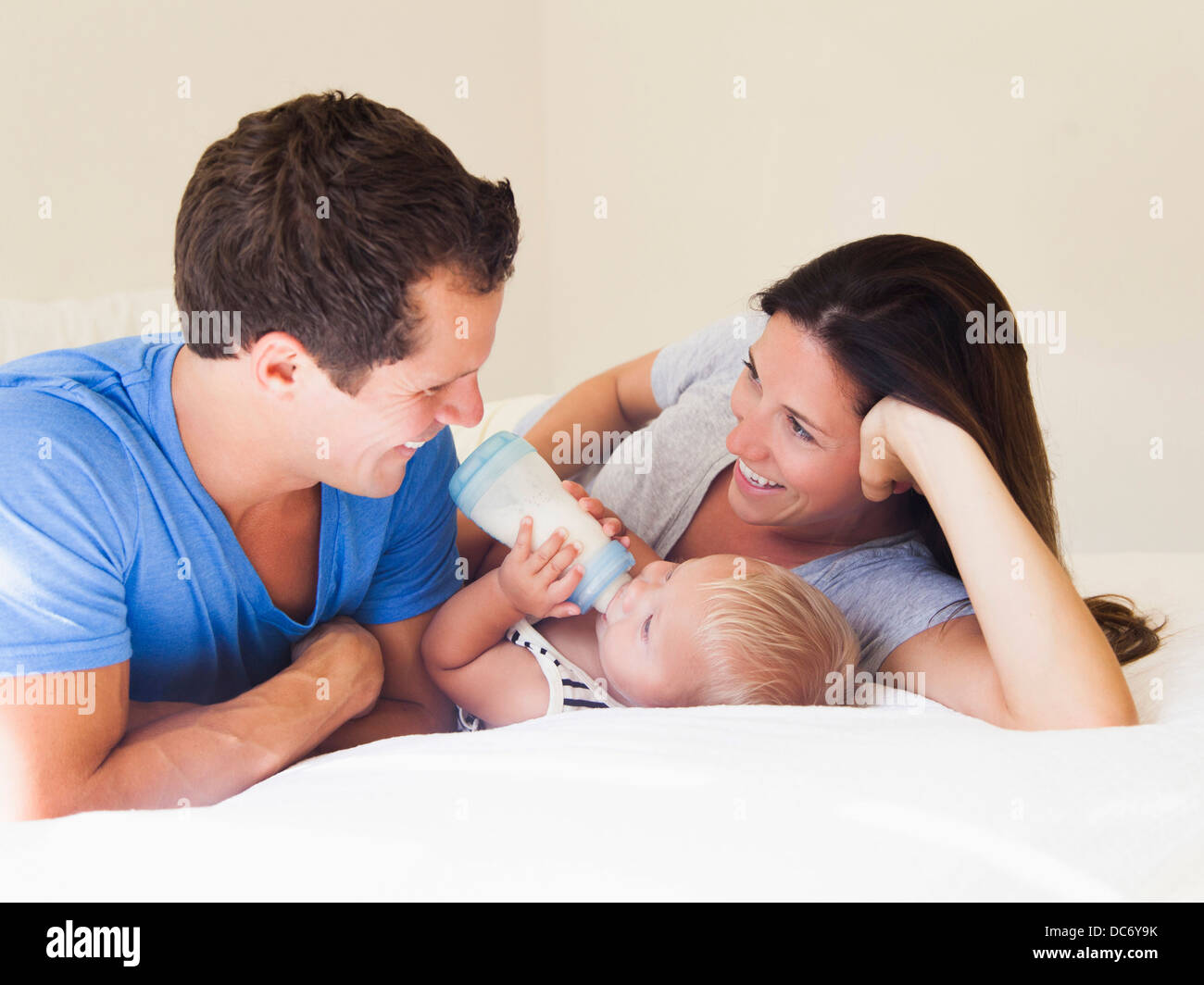 Parents with baby boy (6-11 months) Stock Photo