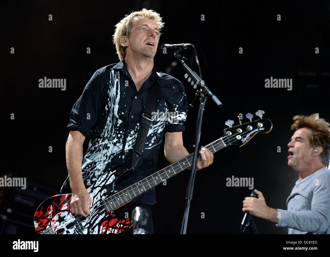 Berlin, Germany. 09th Aug, 2013. Bassist Andreas Meurer and Singer Campino  (R) perform with his band 