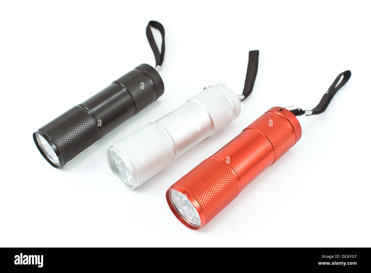 Three pocket flashlight torch isolated on white Stock Photo