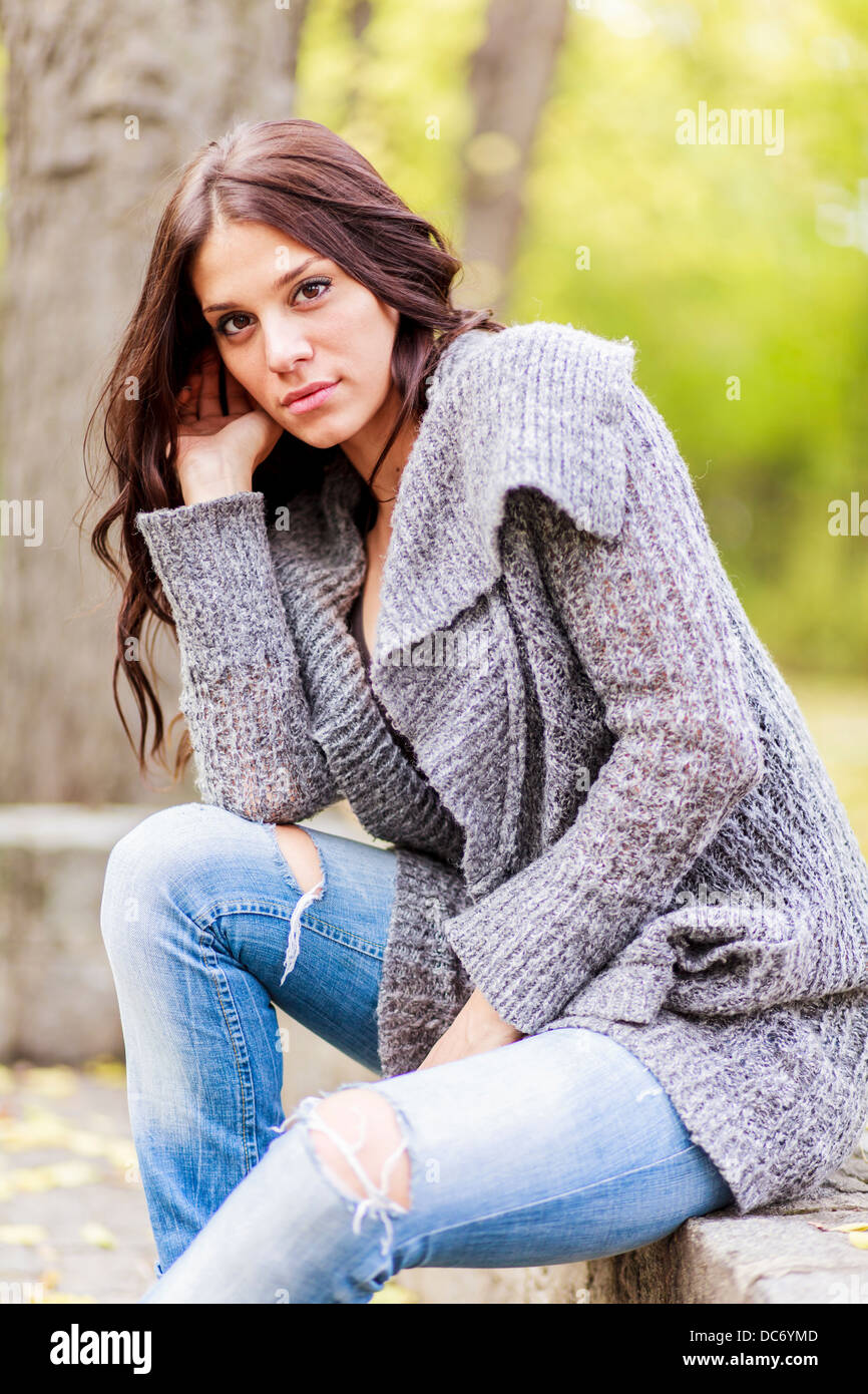Young woman at autumn park Stock Photo - Alamy