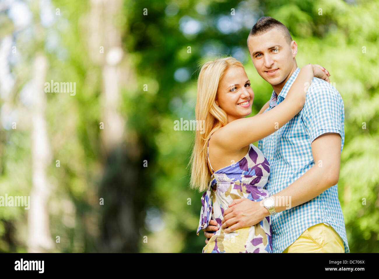 Teen couple in the park Stock Photo