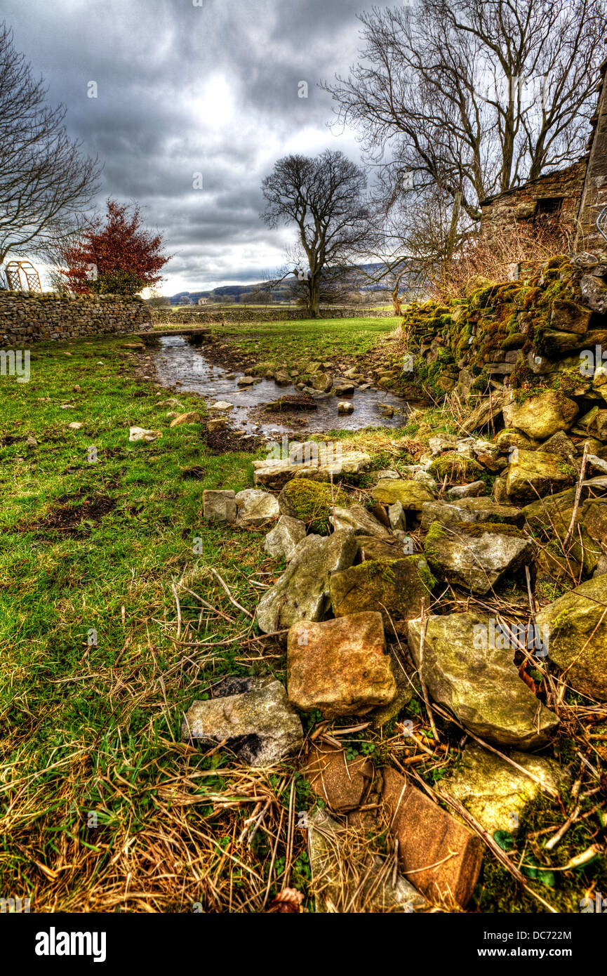 Small brook stream located in Carperby Wensleydale, North Yorkshire UK