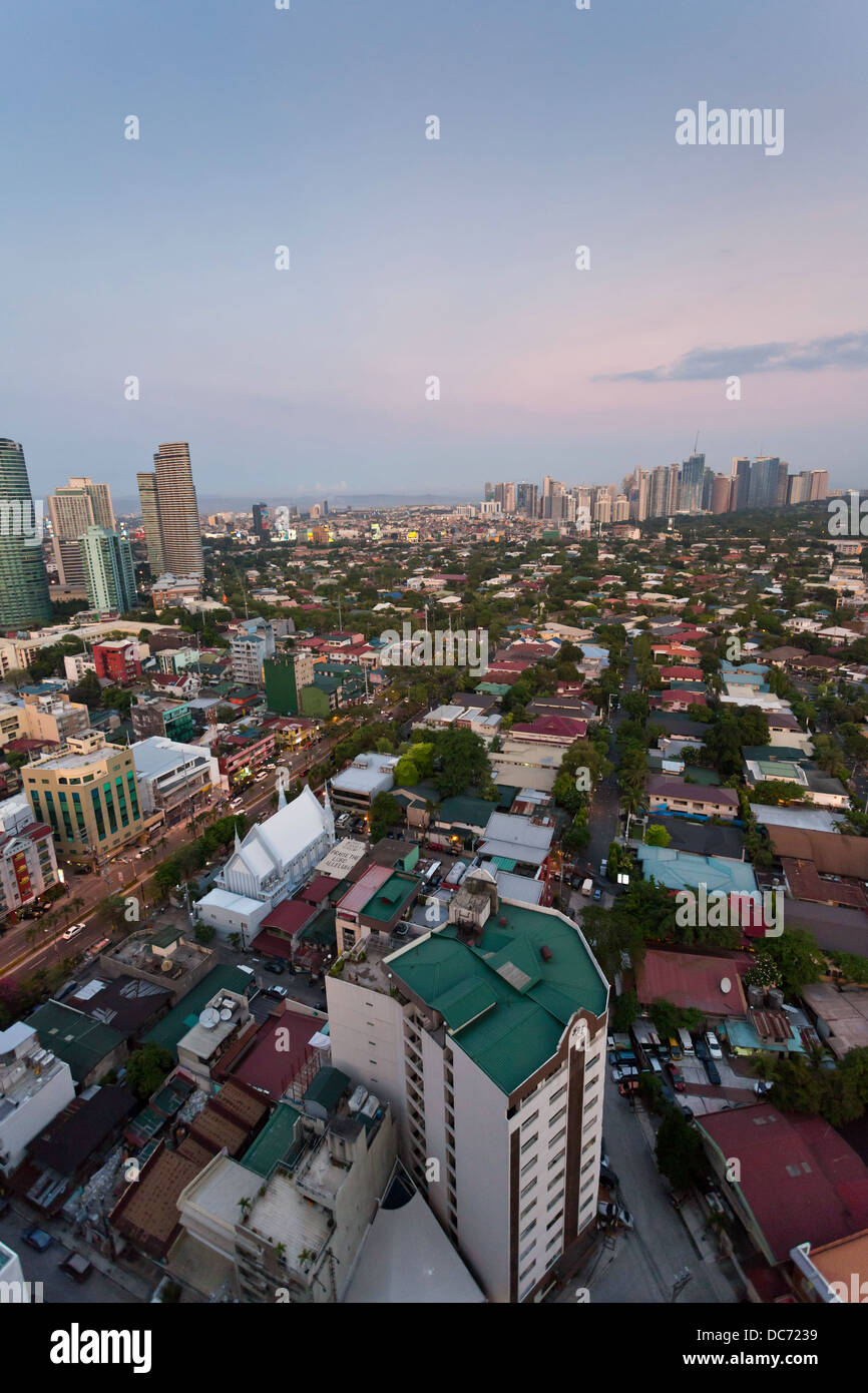 View over Makati City in Metro Manila at Sunset, Philippines Stock Photo