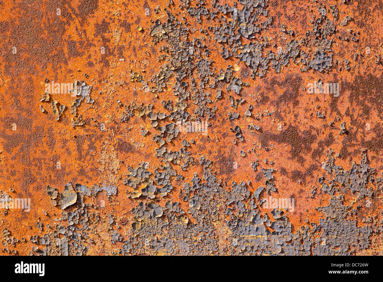 riveted metal plate in rust - background Stock Photo