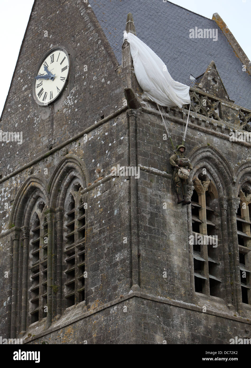 Memorial to John Steele on the spire of Sainte Mere Eglise church, Normandy, France. Stock Photo