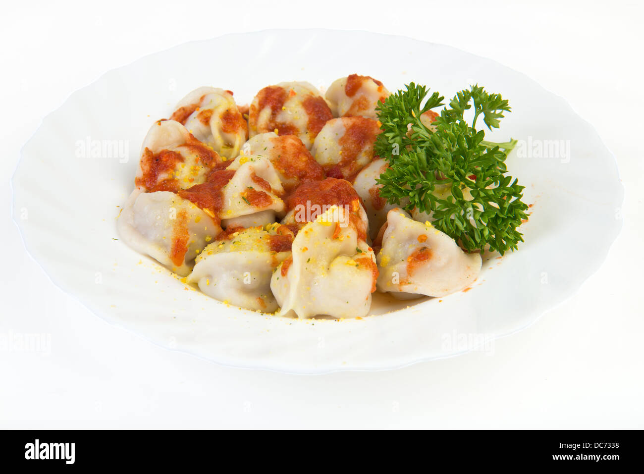 Boiled ravioli with red sauce Stock Photo