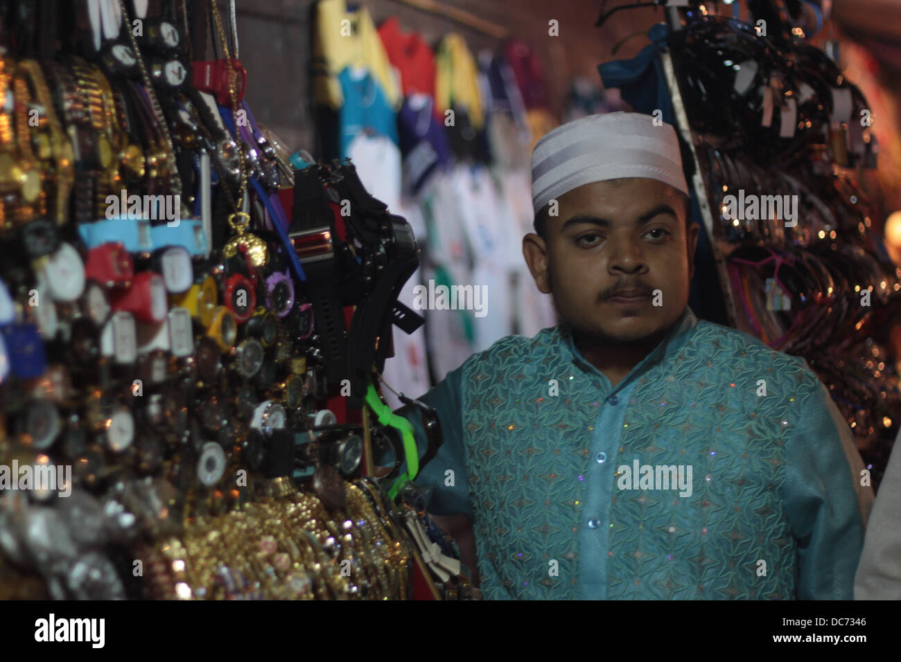A Muslim hawker looks pensively in Delhi, India. Stock Photo