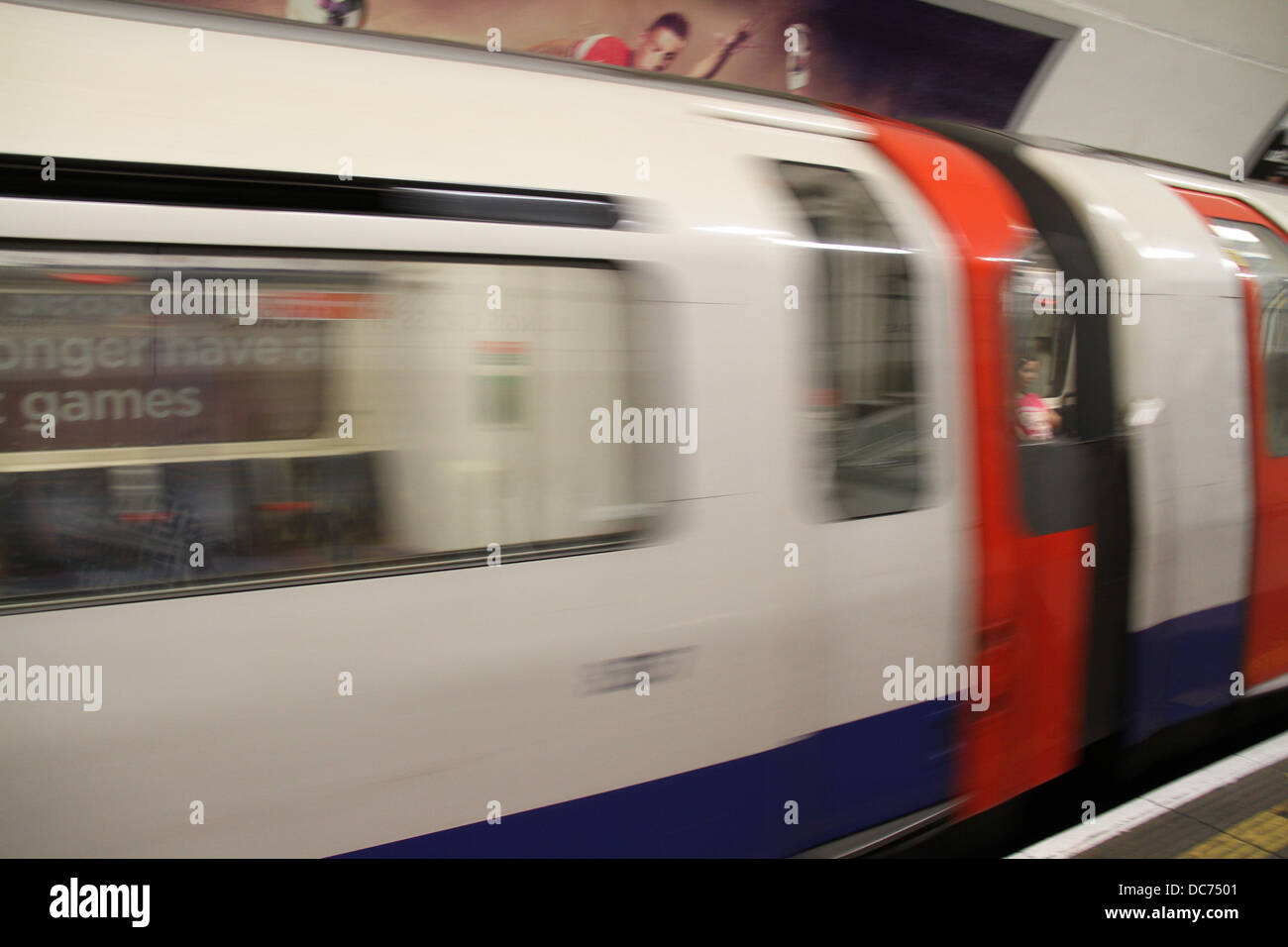 A tube train at Kings Cross St Pancras tube station in London, England