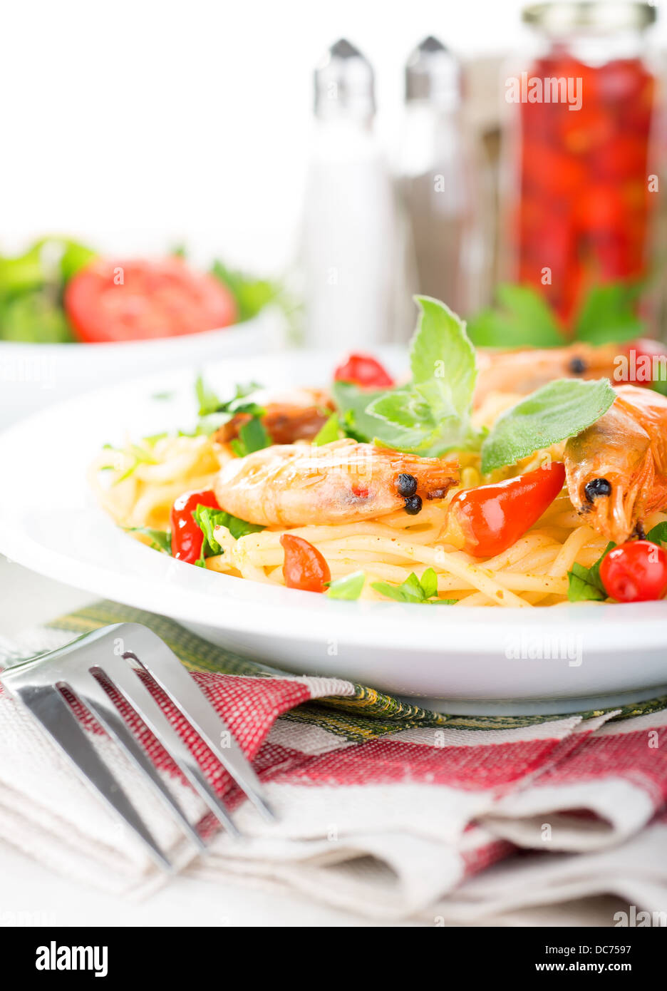Spaghetti with prawns, herbs and hot pepper Stock Photo