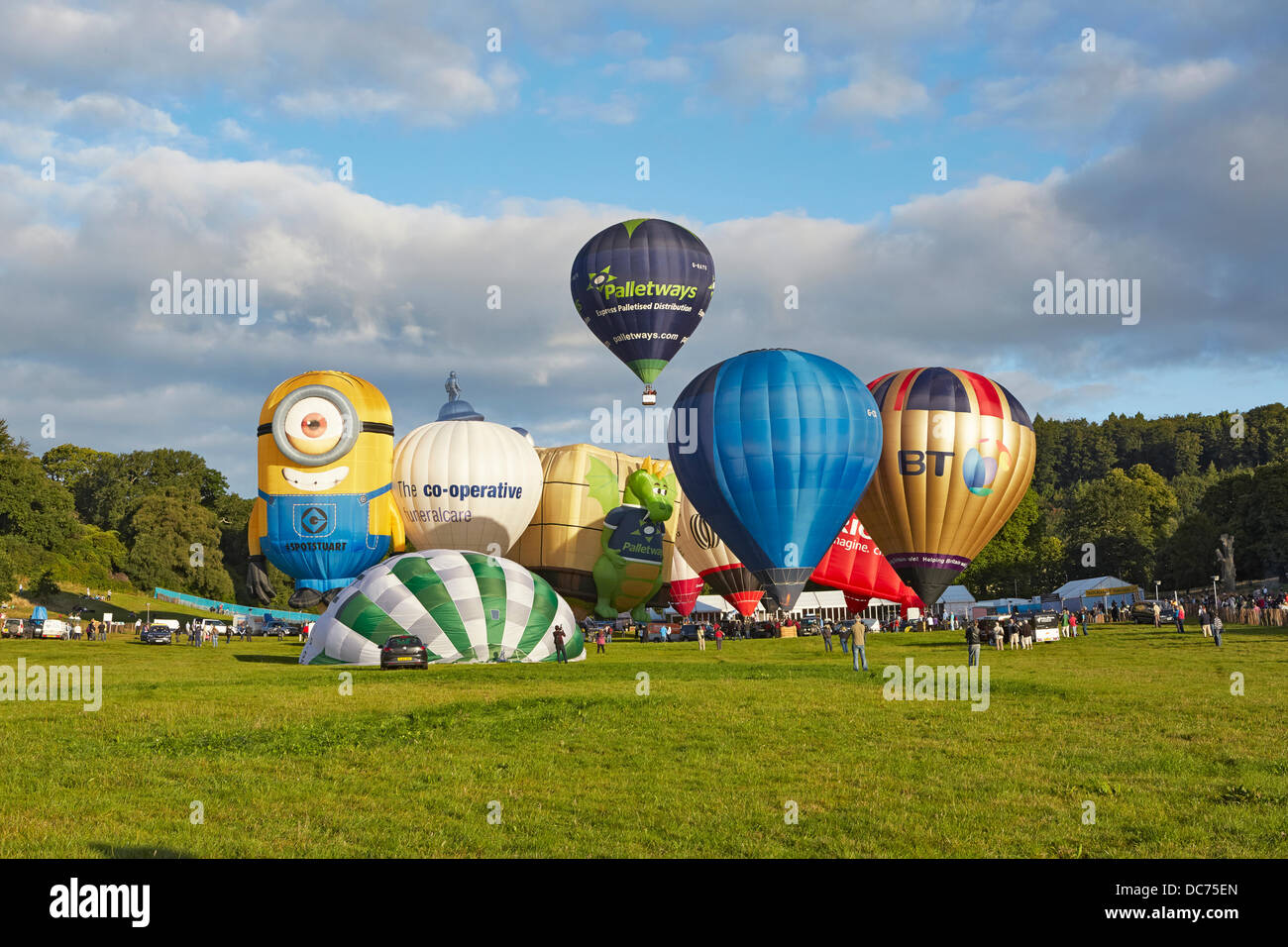 Bristol, UK. 9th Aug, 2013. Balloons at the 35th UK Bristol balloon fiesta at the Ashton court estate Morning launch launch on the 9th August 2013 including the BT FT Ricoh Palletways an Despicable Me Stuart minion balloons Credit:  David Lyon/Alamy Live News Stock Photo