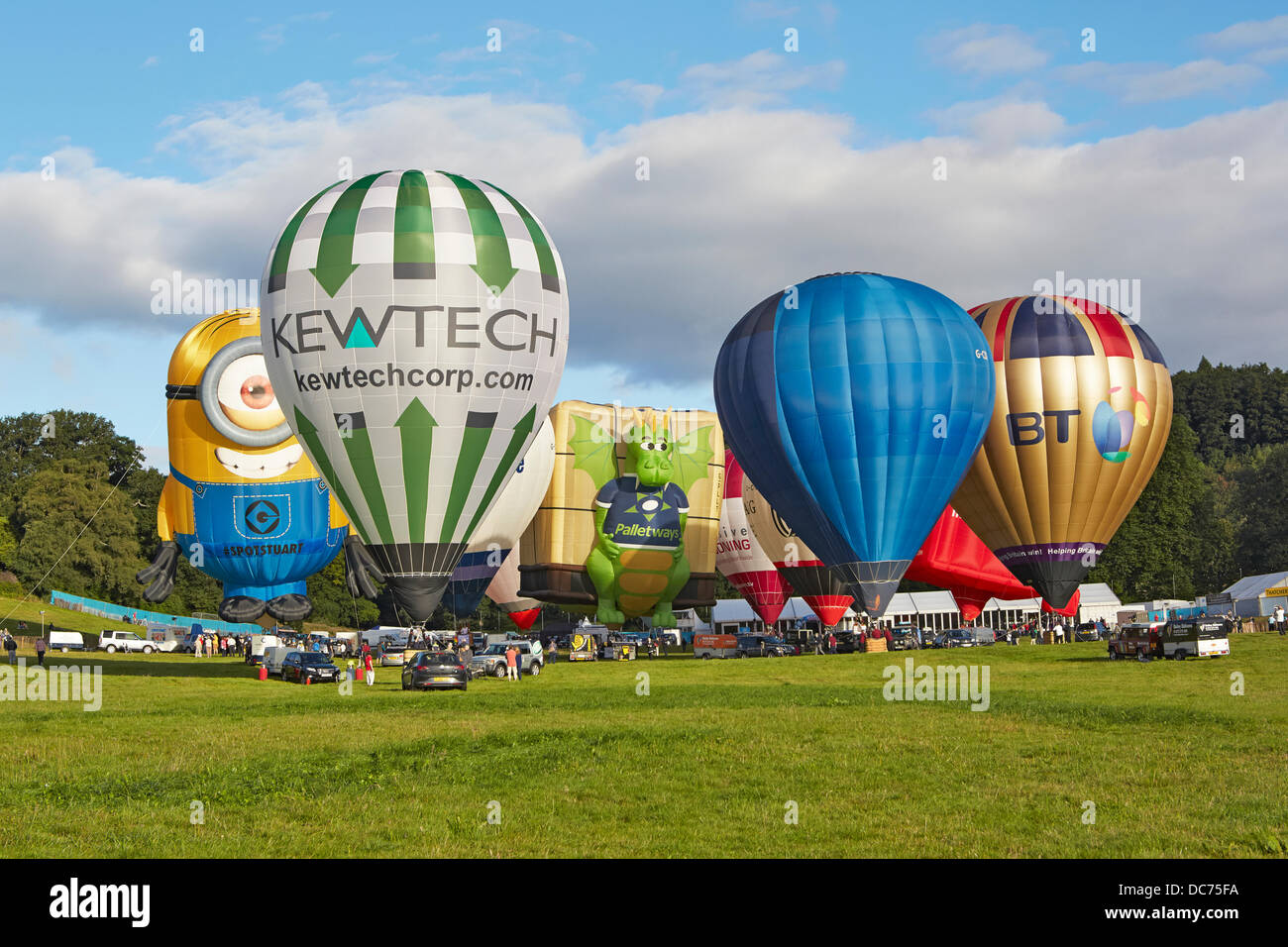 Bristol, UK. 9th Aug, 2013. Balloons at the 35th UK Bristol balloon fiesta at the Ashton court estate Morning launch launch on the 9th August 2013 including the BT FT Ricoh Palletways and Despicable Me Stuart minion balloons Credit:  David Lyon/Alamy Live News Stock Photo