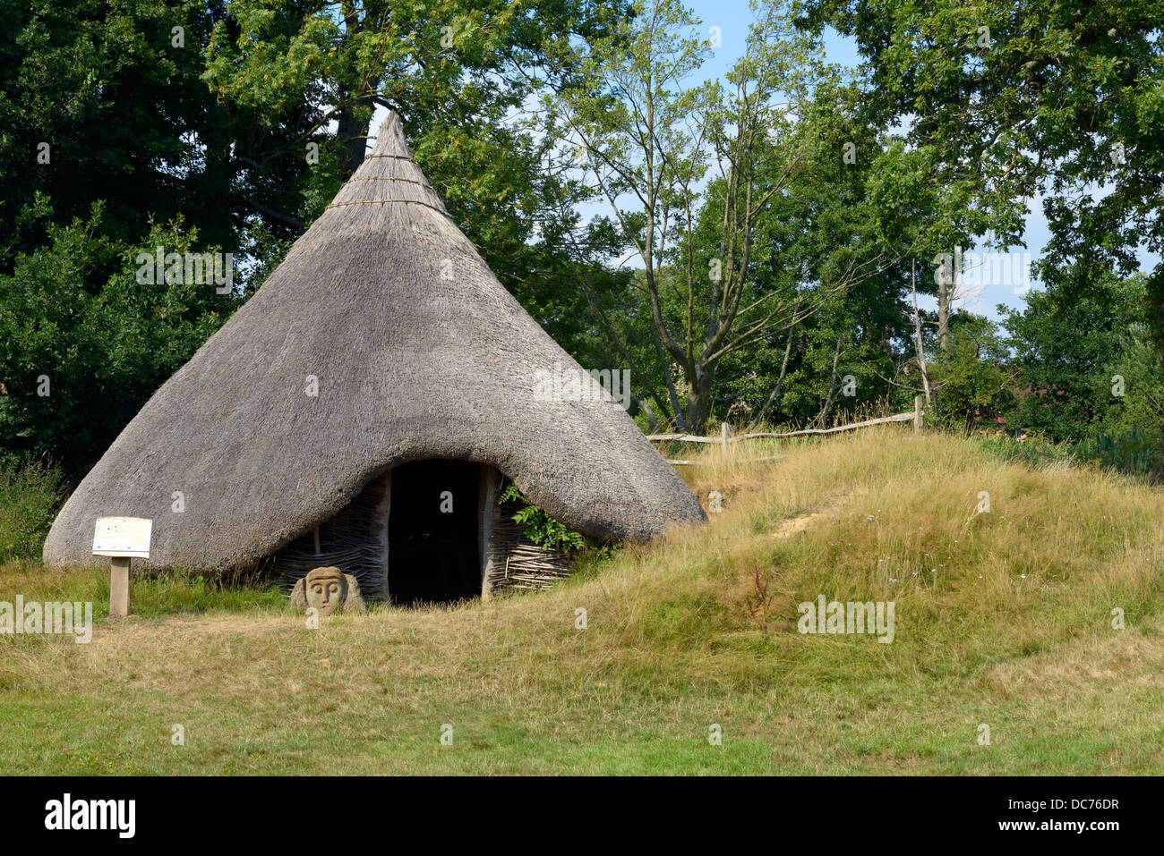 Reconstruction of a late Bronze Age roundhouse in the grounds of Michelham Priory, East Sussex, UK Stock Photo