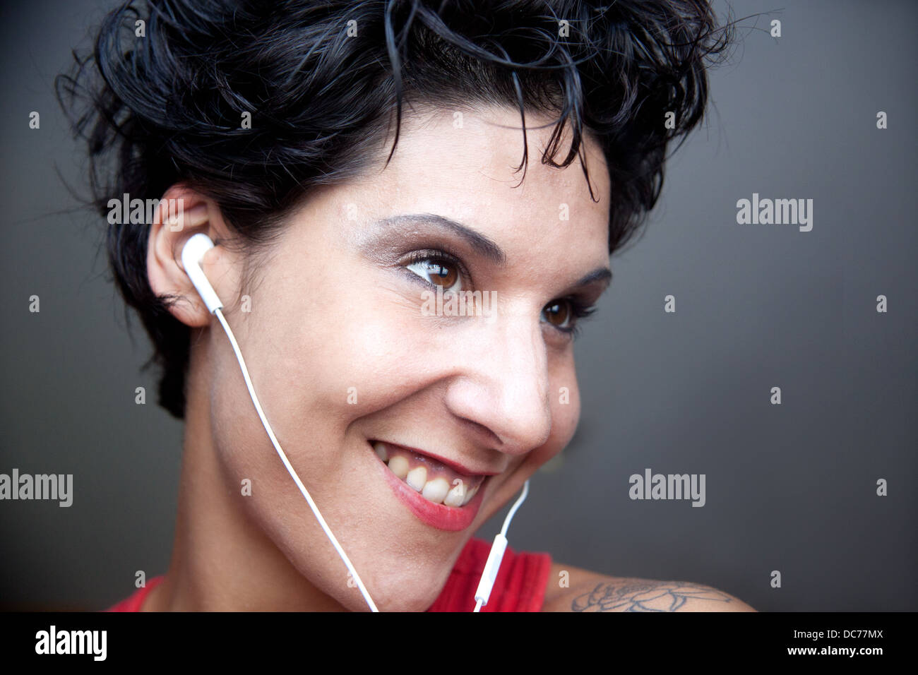 woman listening music with earphone Stock Photo