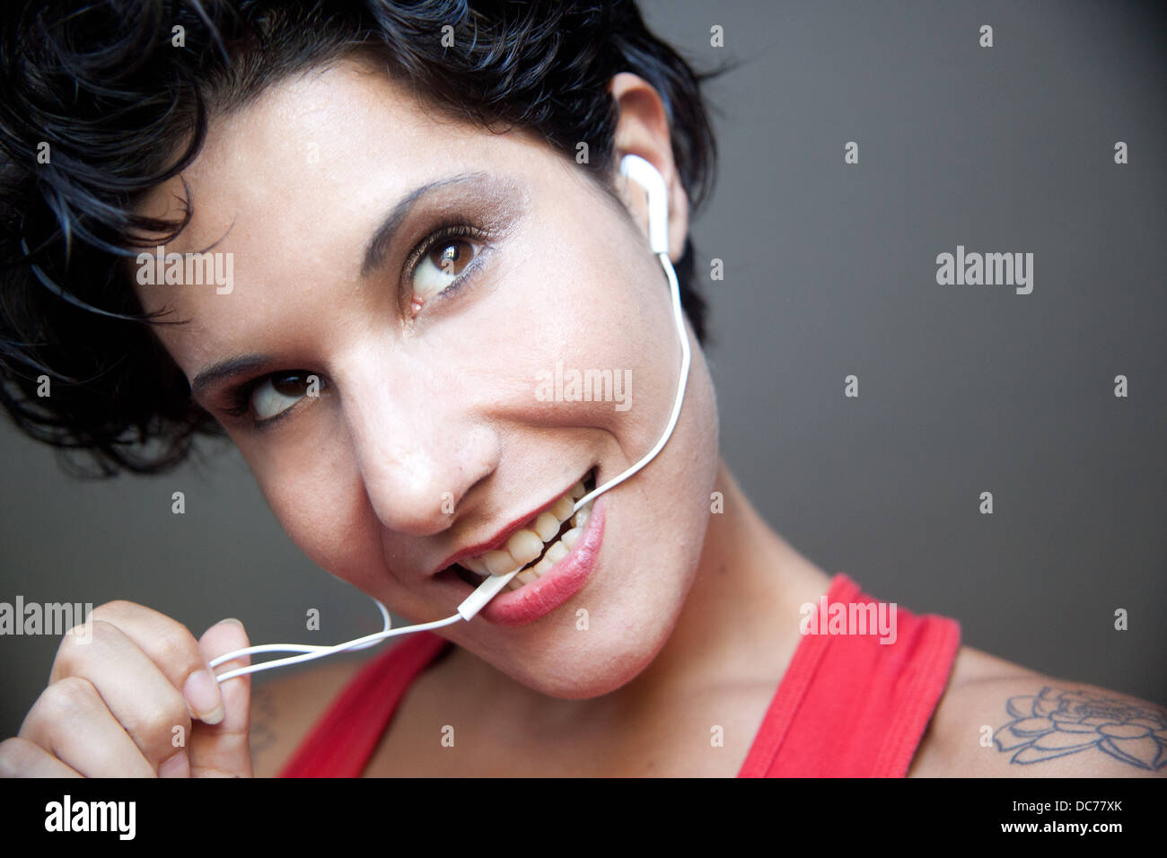 woman listening music with earphone Stock Photo