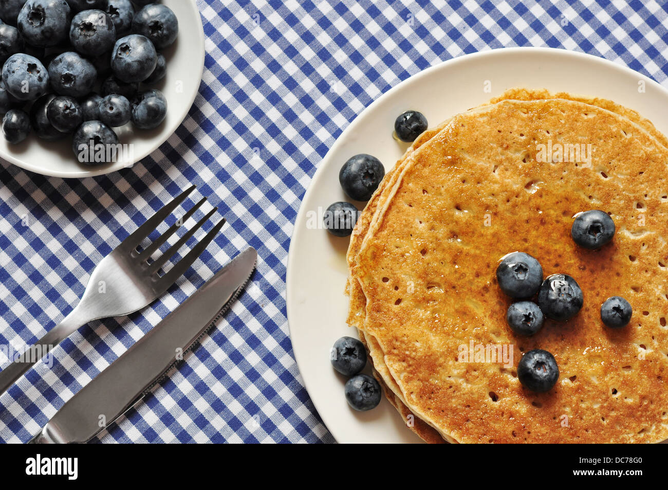 Delicious pancakes with fresh blueberries and maple syrup Stock Photo