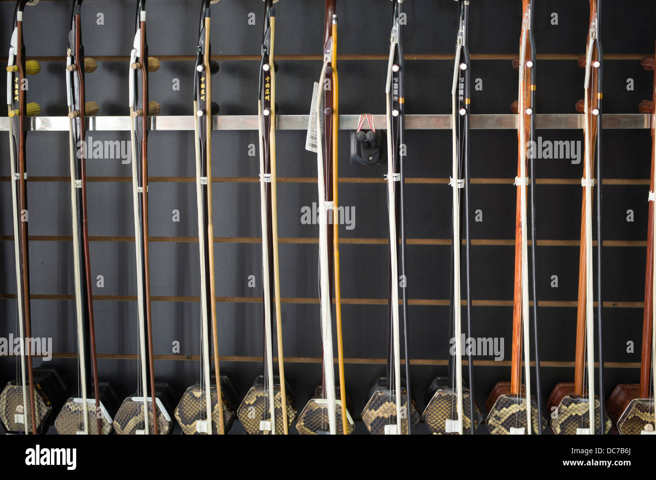 Erhu Instruments on sale in a music shop in Shanghai China. Stock Photo