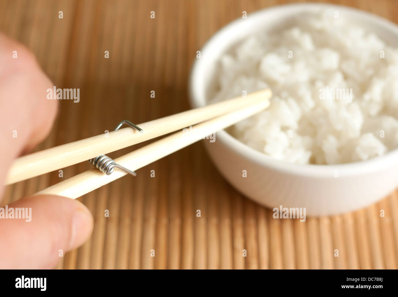 Invention of eating with chopsticks creative food concept Stock Photo
