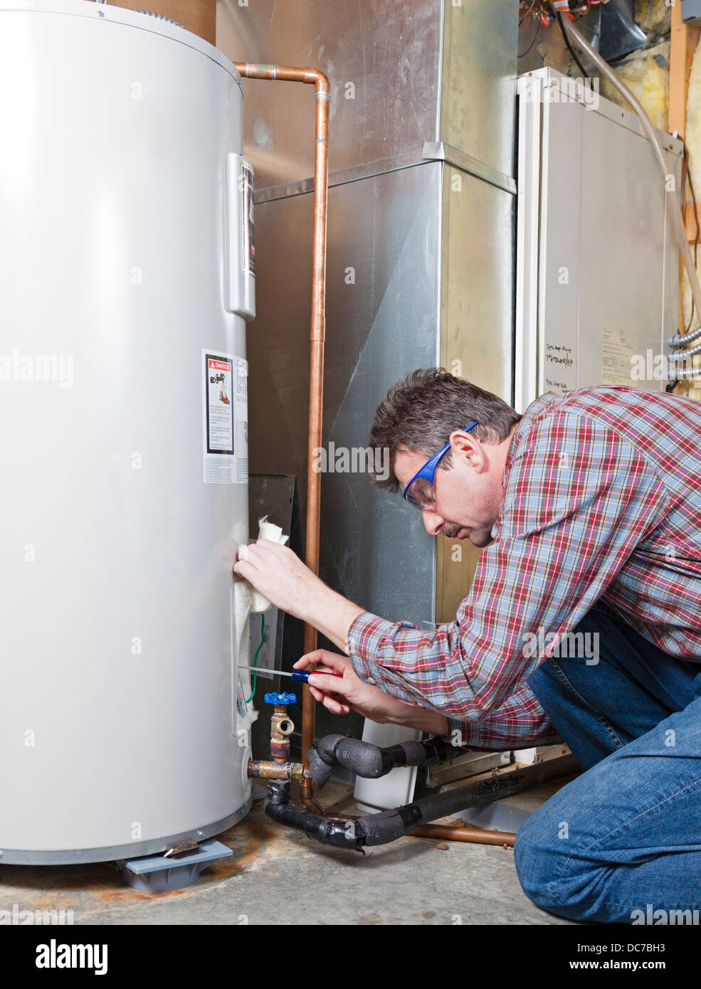 Water heater maintenance Stock Photo Alamy