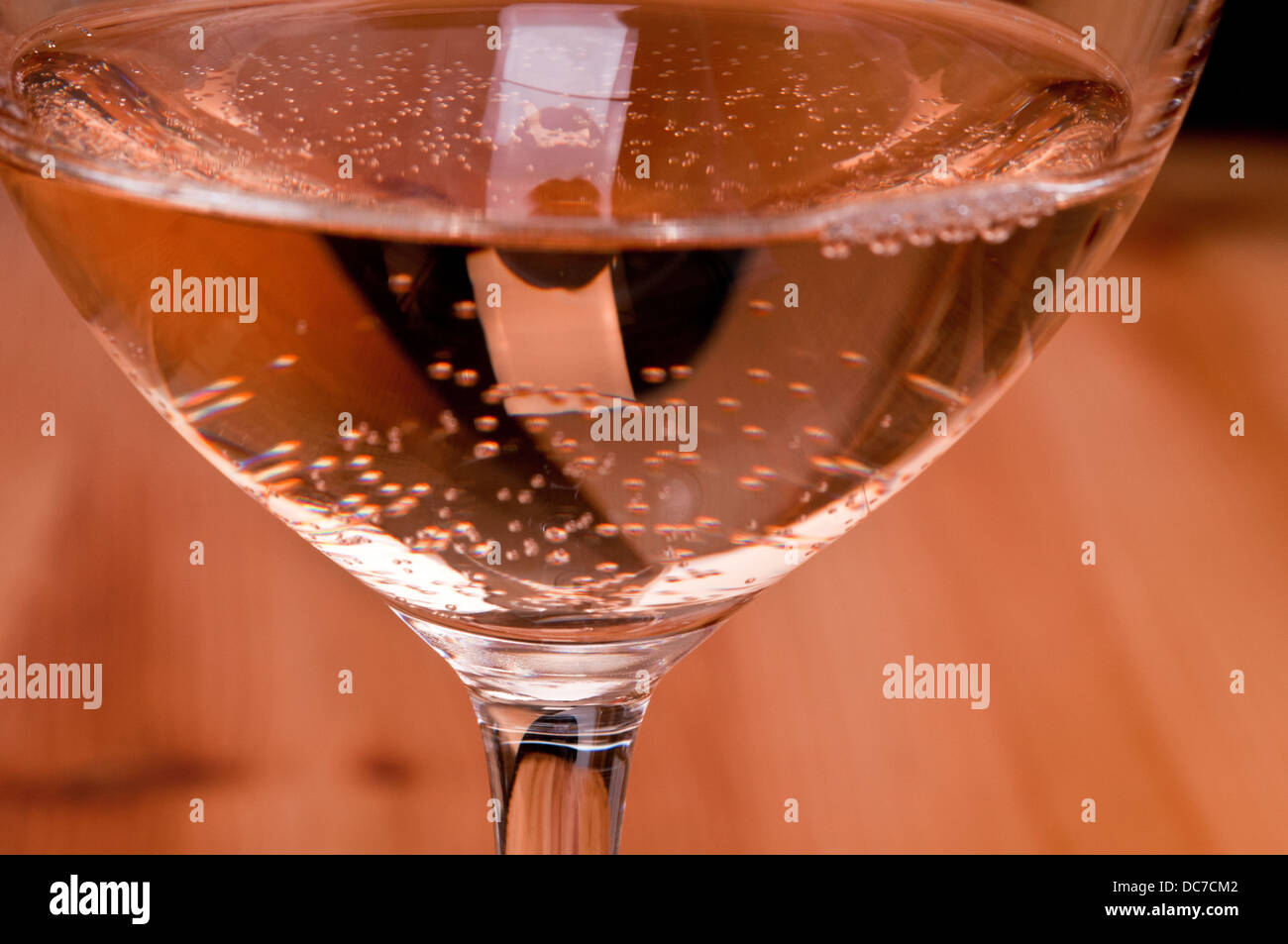 Carbonic acid in a glass of rose wine Stock Photo