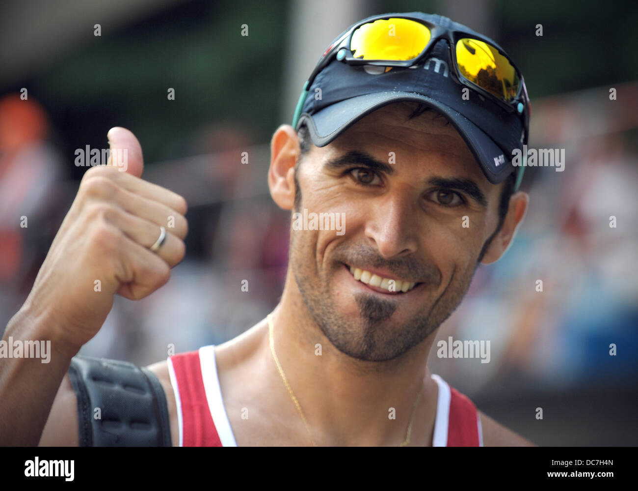 Berlin, Germany. 10th Aug, 2013. Pablo Herrera Allepuz from Spain celebrates his thrid place at the beach volleyball grand slam at the Waldbuehne in Berlin, Germany, 10 August 2013. Photo: OLIVER MEHLIS/dpa/Alamy Live News Stock Photo