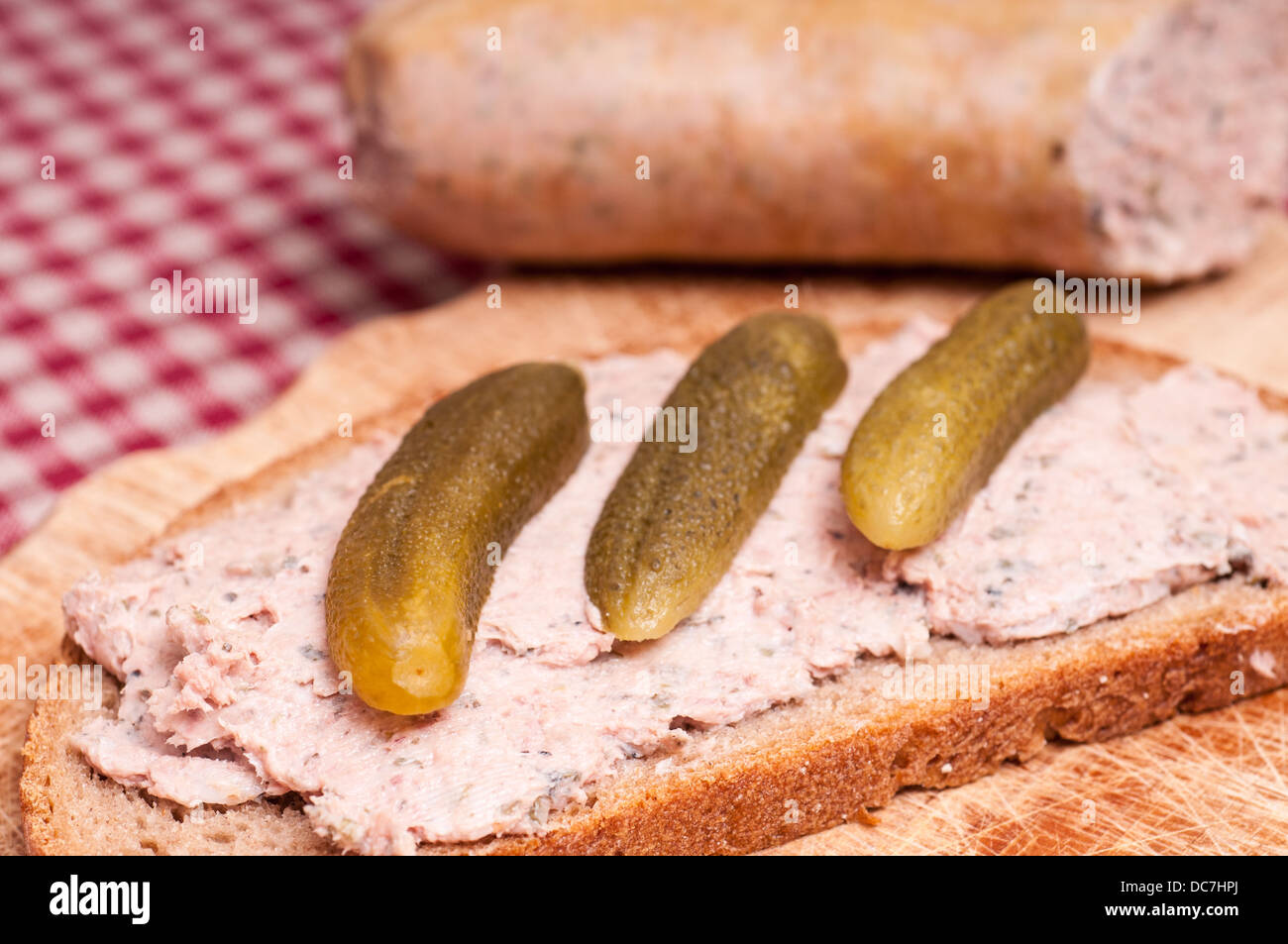 Close up of a liver sausage sandwich with pickled cucumbers Stock Photo Alamy