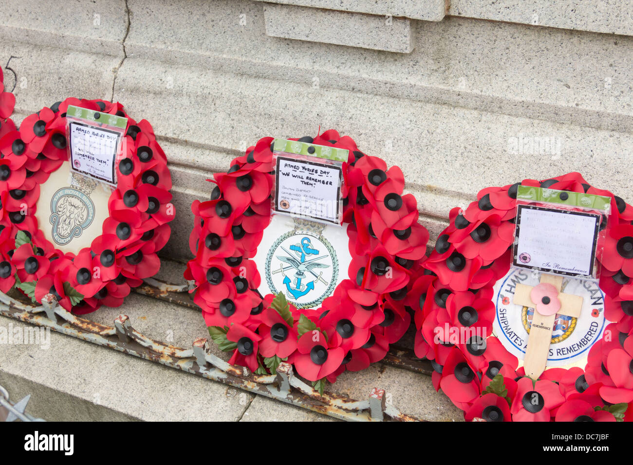 Poppy wreaths for Armed Forces Day 2013 laid on the war memorial in Victoria Square, Bolton, Lancashire. Stock Photo