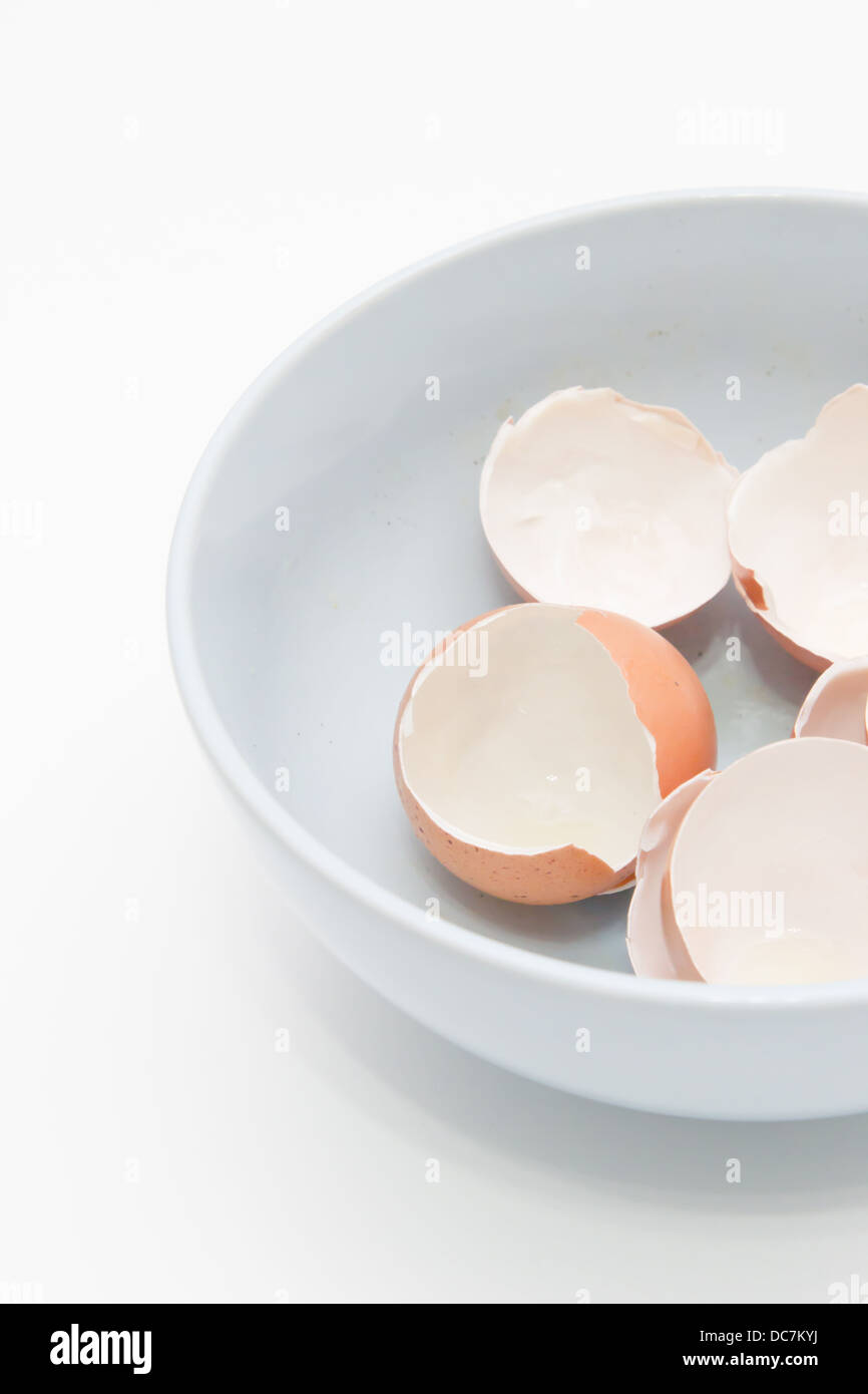 Heap of egg shell in a dirty bowl with white background Stock Photo Alamy