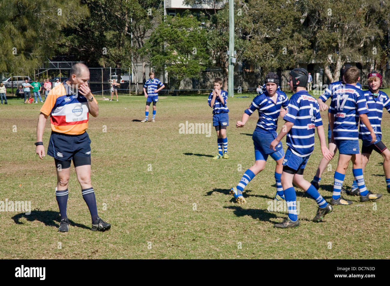 Australian boys play rugby union in newport,Sydney,australia as referee