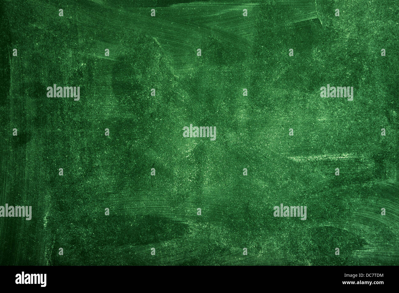 Green school chalkboard texture as background for school themes. Stock Photo
