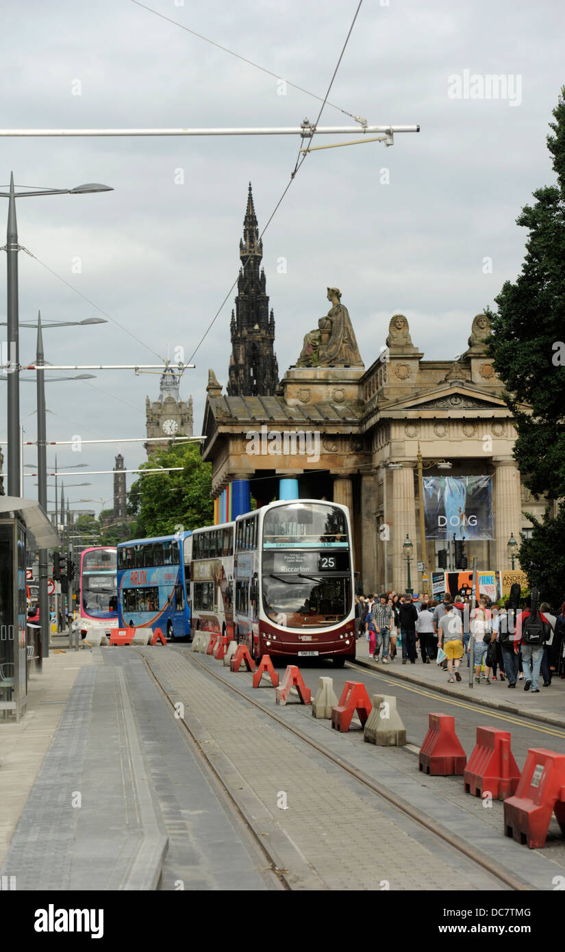 Lothian Buses, Edinburgh. The double decker bus pictured here on Princes Street Edinburgh where tram lines have been layed Stock Photo