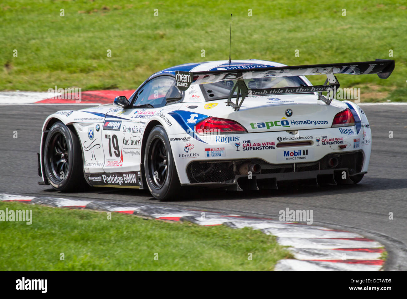 #79 - Ecurie Ecosse - BMW Z4 - Marco ATTARD / Oliver BRYANT exiting Surtees at Brands Hatch during BritishGT Stock Photo