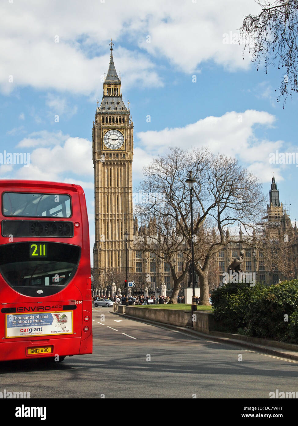 Big Ben with Red Bus in Scene Westminster London United Kingdom England Stock Photo