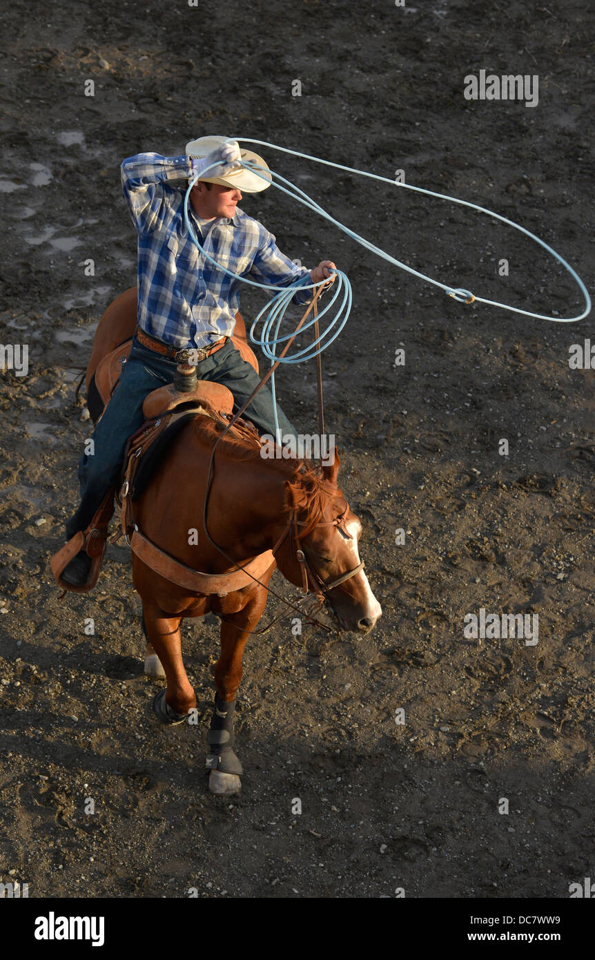 Cowboy practicing roping before the Chief Joseph Days Rodeo in Joseph, Oregon. Stock Photo