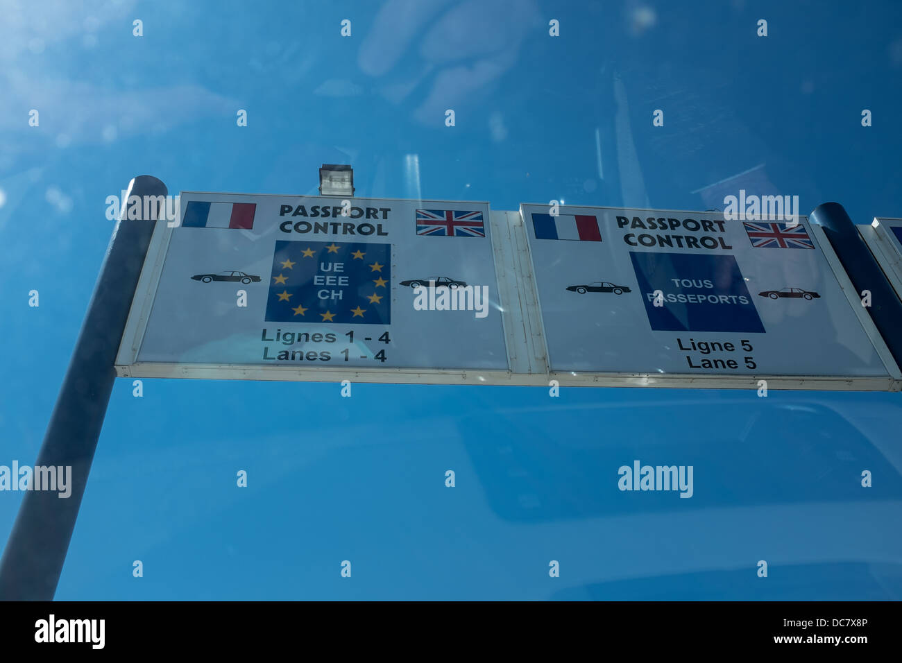 Passport Control Barrier Sign Taken Through a Car Windscreen, Calais, France. Stock Photo