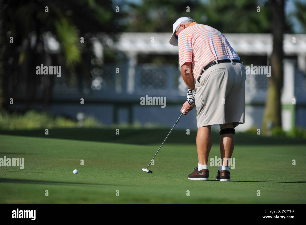 Residents golfing on the Golf course at the Mallory Hill Country Club in The Villages, Florida. Stock Photo