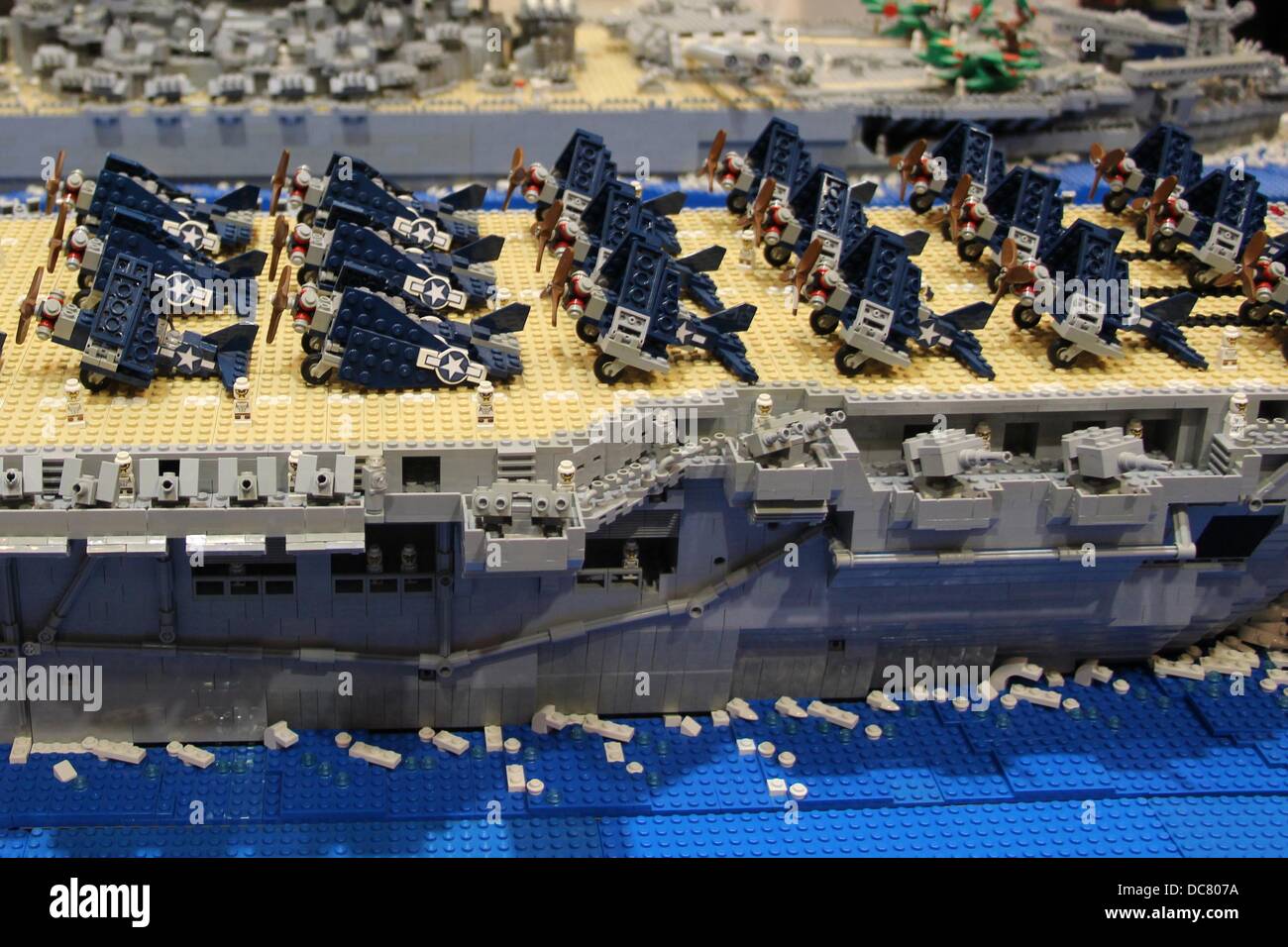 Santa Clara Convention Center, California USA 11th August, 2013 Bricks By The Bay annual Lego convention promotes creativity. World War II USS Yorktown CV10 (Essex class) aircraft carrier by Marcello De Cicco. Over 26,000 Lego bricks, weighs 76 pounds, 8 feet 6 inches long, 21 inches tall and 18 inches wide, separates into 4 sections, took 2 years 3 months to build. August 11, 2013 Credit: Lisa Werner/Alamy Live News Stock Photo