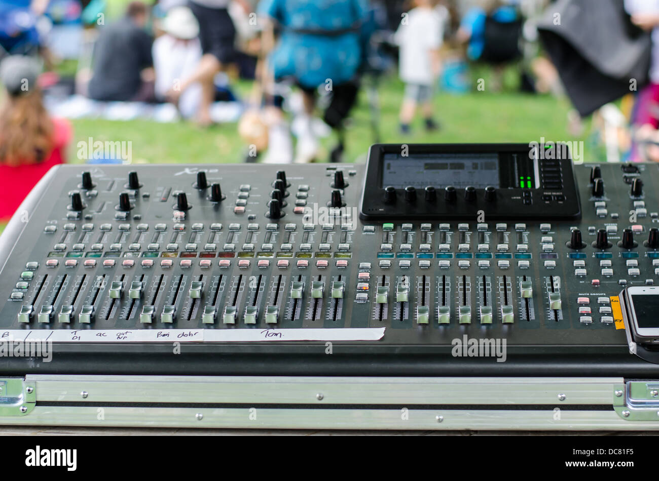 Sound mixing Board at a concert in the park at a Ribfest, Stock Photo