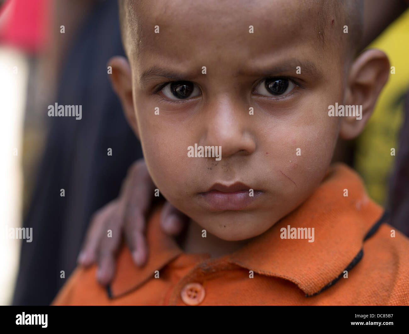 Portrait of young Indian Boy on the streets in Varanasi India Stock Photo