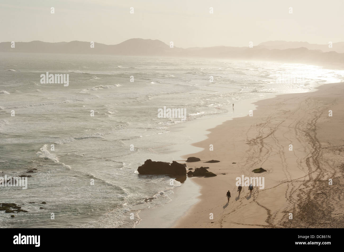 People walking on the beach, Brenton-on-Sea near Knysna, Western Cape, South Africa Stock Photo
