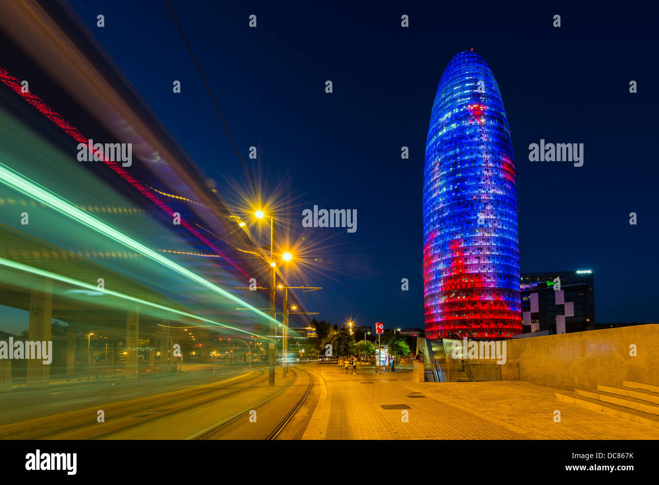Agbar Tower or Torre Agbar illuminated at night, Barcelona, Catalonia, Spain Stock Photo