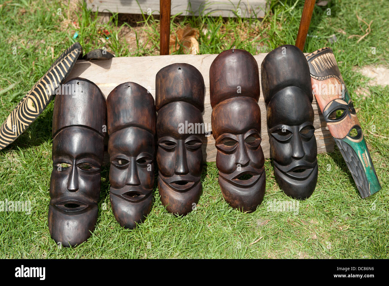 Wooden masks for sale at the Craft Market, Knysna, Western Cape, South Africa Stock Photo