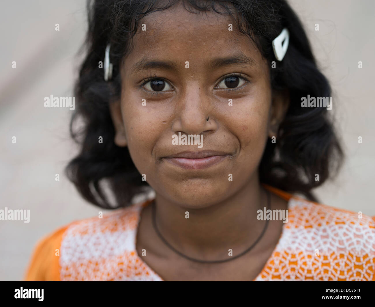 Portrait of young Indian giril by the Ganges River ( Varanasi ) Stock Photo