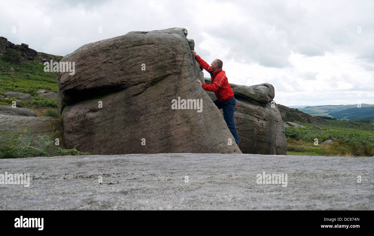 rock climber bouldering at Burbage Edge South, Derbyshire, Peak District National Park, England, UK, United, Kingdom, Great, Bri Stock Photo