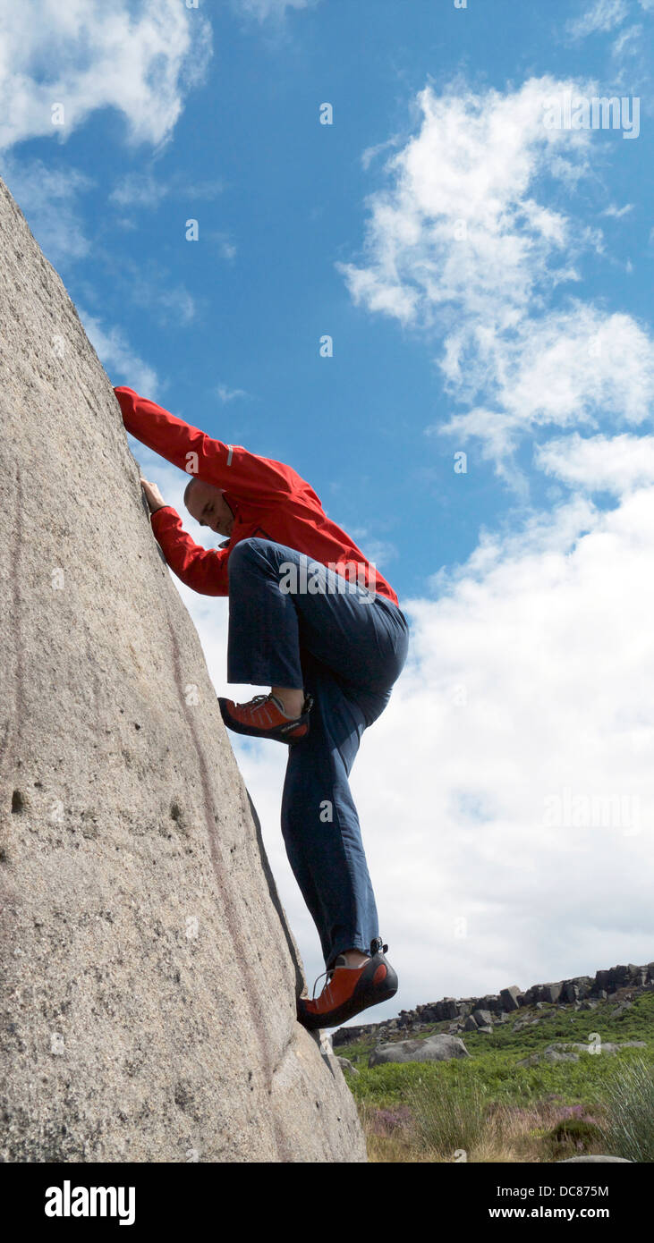 rock climber bouldering at Burbage Edge South, Derbyshire, Peak District National Park, England, UK, United, Kingdom, Great, Bri Stock Photo